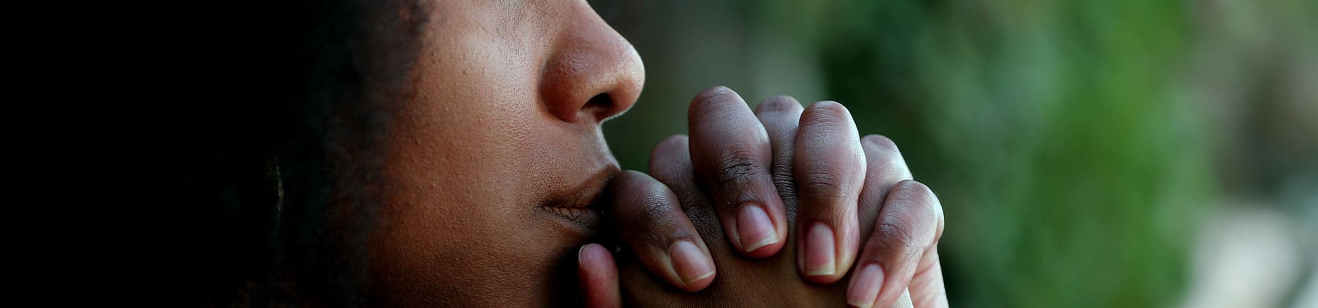 Woman Holding Hands Praying